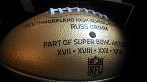 The NFL Super Bowl "golden football" given to the school by the NFL to commemorate the 50th Super Bowl game. The ball was given to honor high schools which had a graduate who played in a Super Bowl. Russ Grimm played in three Super Bowls and coached in a fourth.