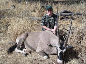Schultheis posing with an Oryx