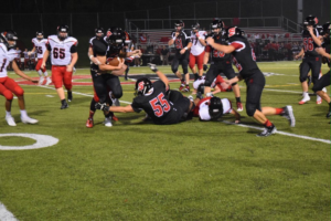 Tommy Pisula recovering fumble on Sep. 9 against Charleroi