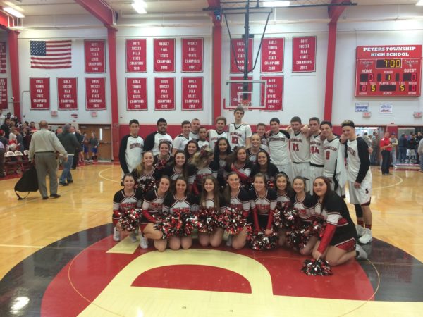 Southmoreland basketball team and cheerleaders after win over Avonworth